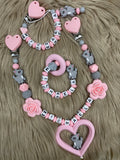 Schnullerkette, Kinderwagenkette und Greifring Reh in rosa-grau, personalisiert mit Namen