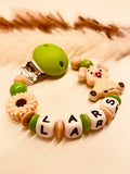 Schnullerkette Schwein Blume grün beige personalisiert mit Namen Geschenk für das Baby Geburt