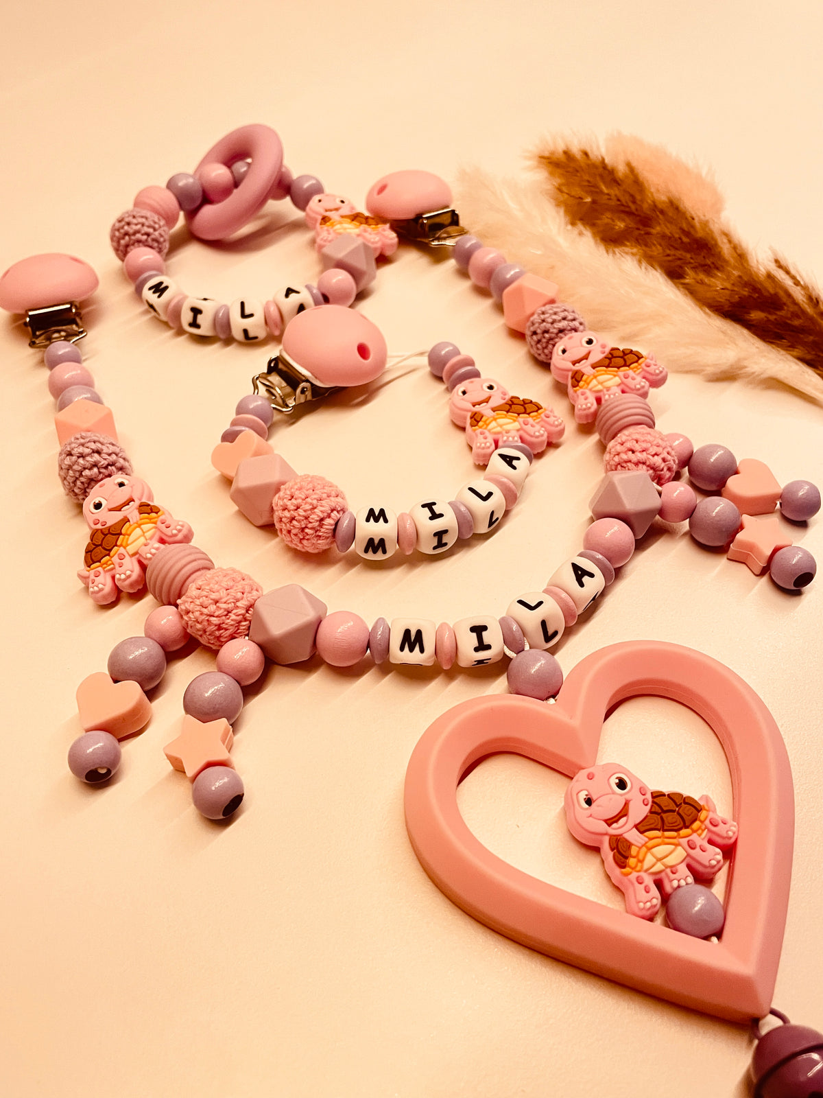 Schnullerkette, Kinderwagenkette, Greifring personalisiert Schildkröte rosa flieder