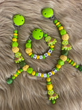 Schnullerkette und Kinderwagenkette Schildkröte in grün-gelb, personalisiert mit Namen