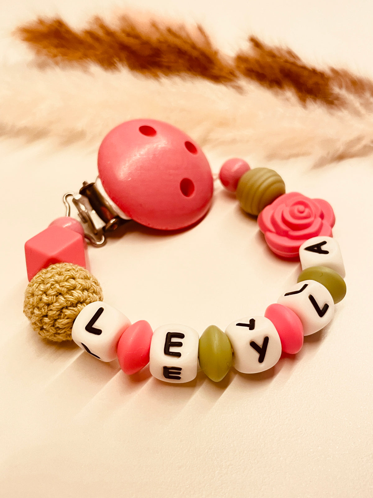 Schnullerkette Rose pink grün 12,90€, statt 17,90€