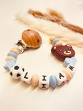Schnullerkette Affe mit Fußball blau beige personalisiert handgefertigt Babygeschenk Junge