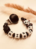 Schnullerkette Panda schwarz
