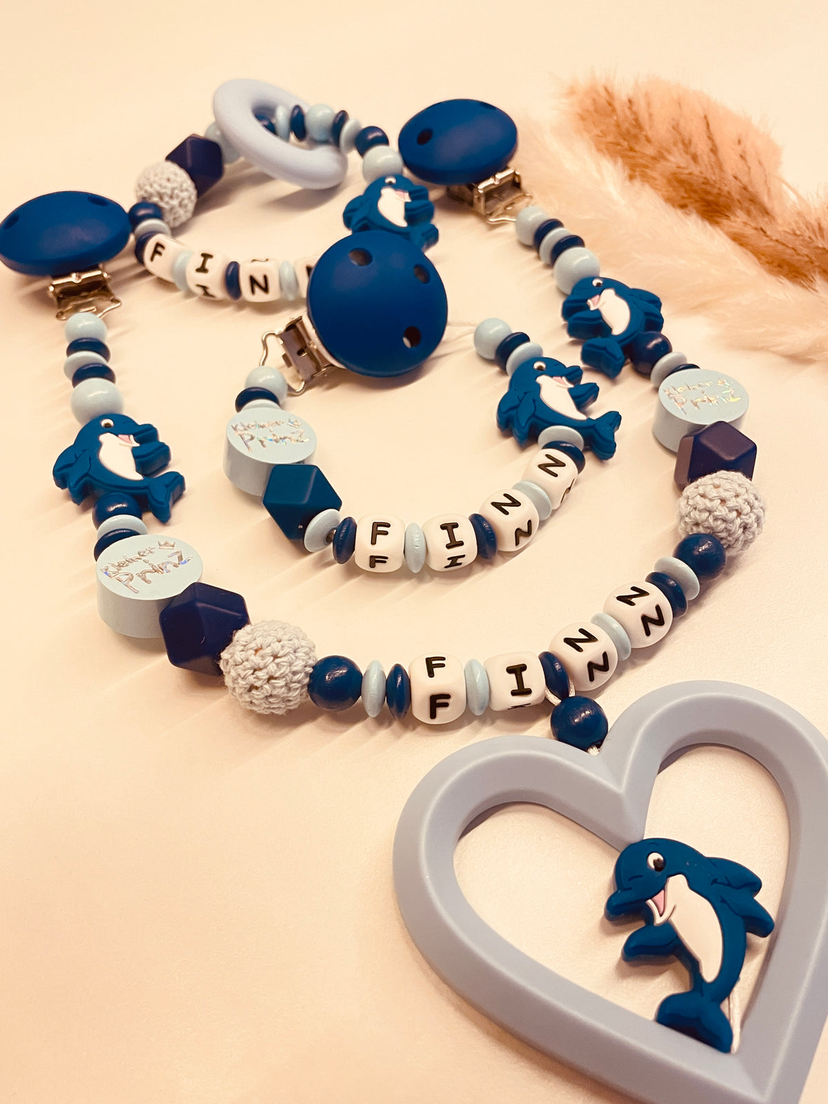 Schnullerkette, Kinderwagenkette, Greifring Delfin kleiner Prinz blau