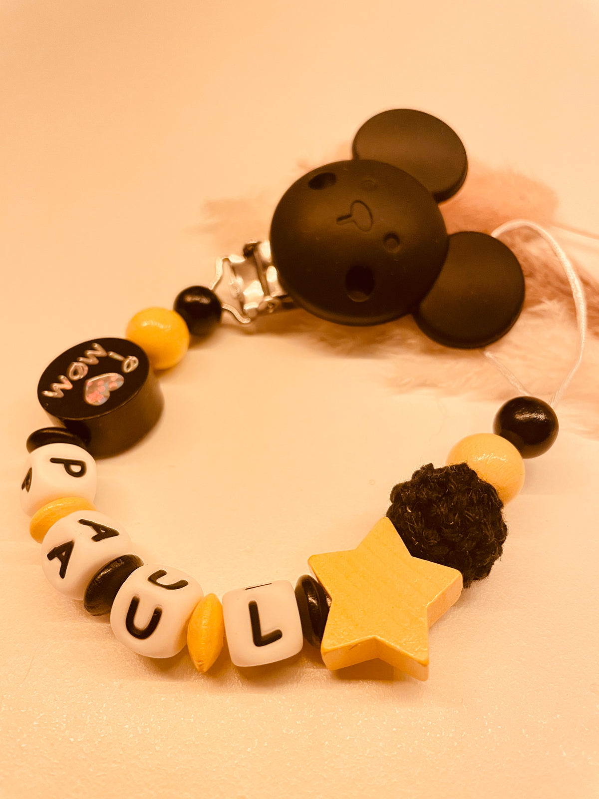 Schnullerkette mit Namen personalisiert schwarz gelb I love mom/dad Stern