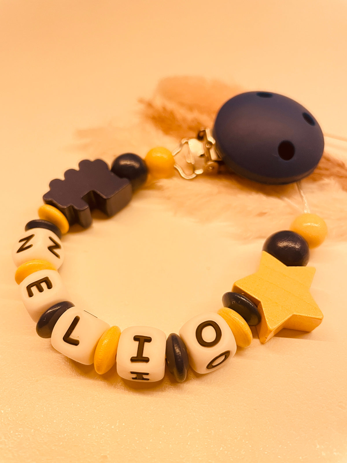 Schnullerkette mit Namen personalisiert blau gelb Lokomotive Stern