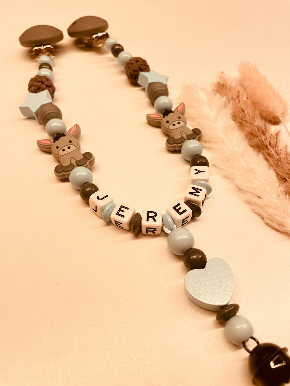 Schnullerkette Kinderwagenkette Greifring personalisiert mit Namen Esel blau/grau