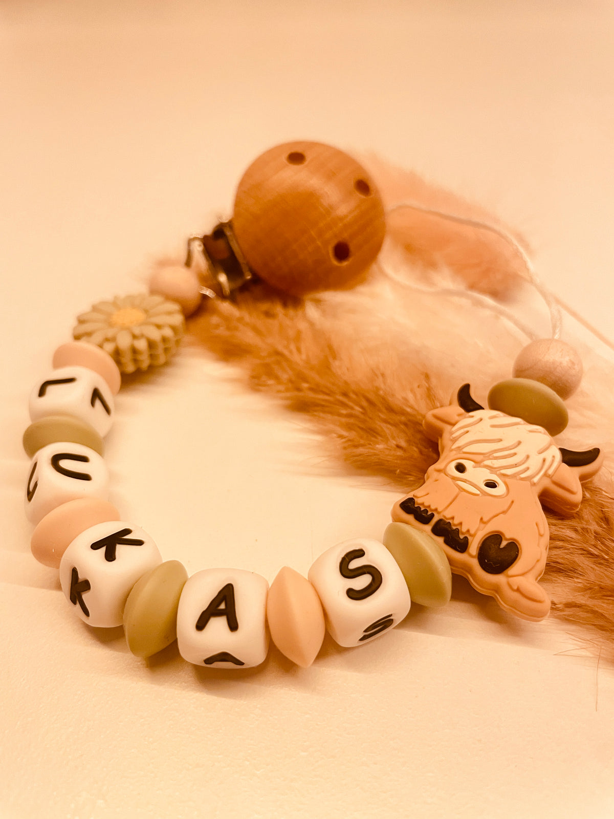 Schnullerkette Highlandcow grün beige