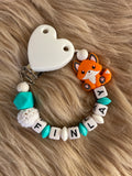 Schnullerkette Fuchs türkis weiß, personalisiert mit Namen