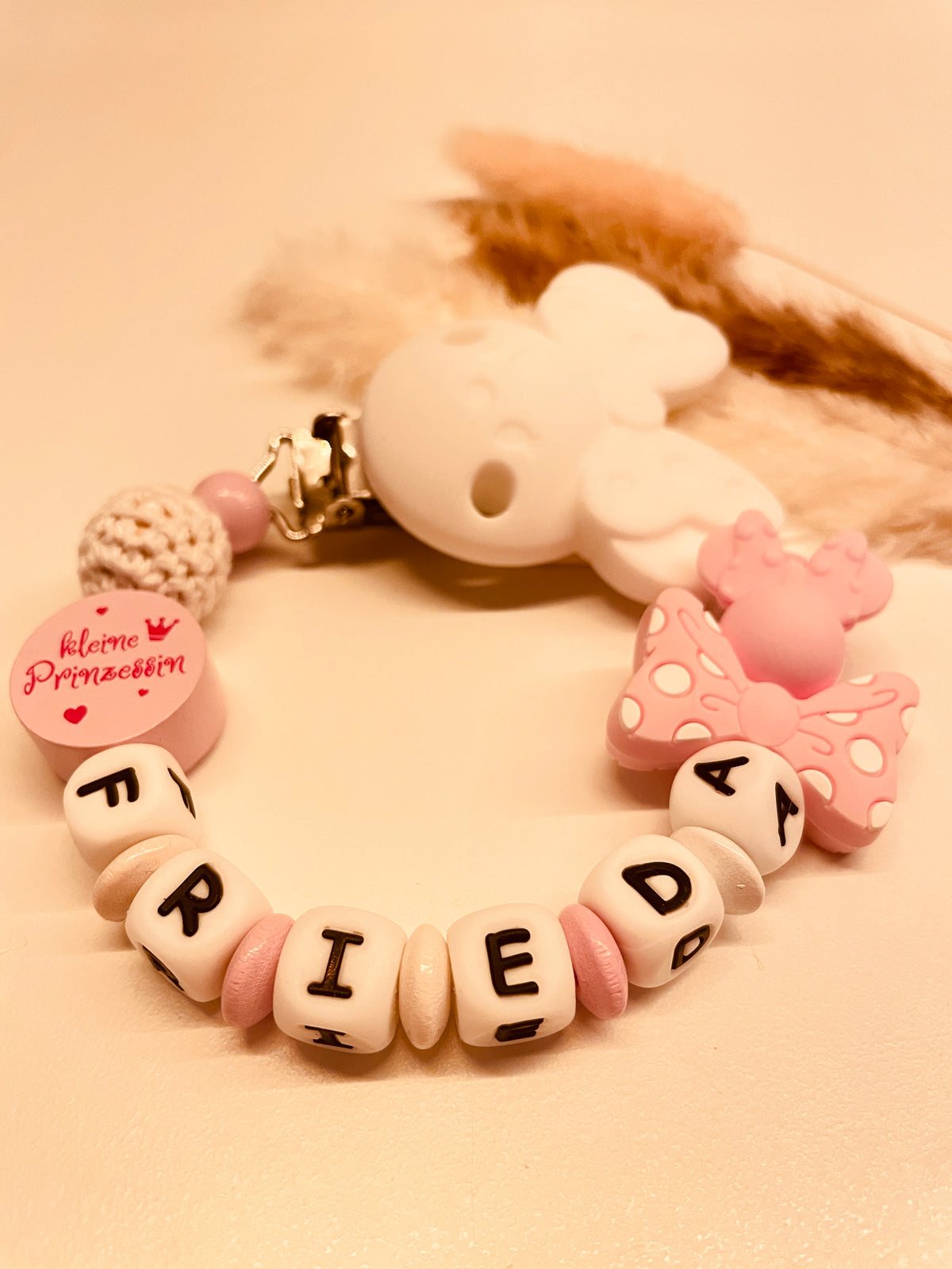 Schnullerkette, Kinderwagenkette und Greifring Maus mit Schleife kleine Prinzessin in rosa-weiß, personalisiert