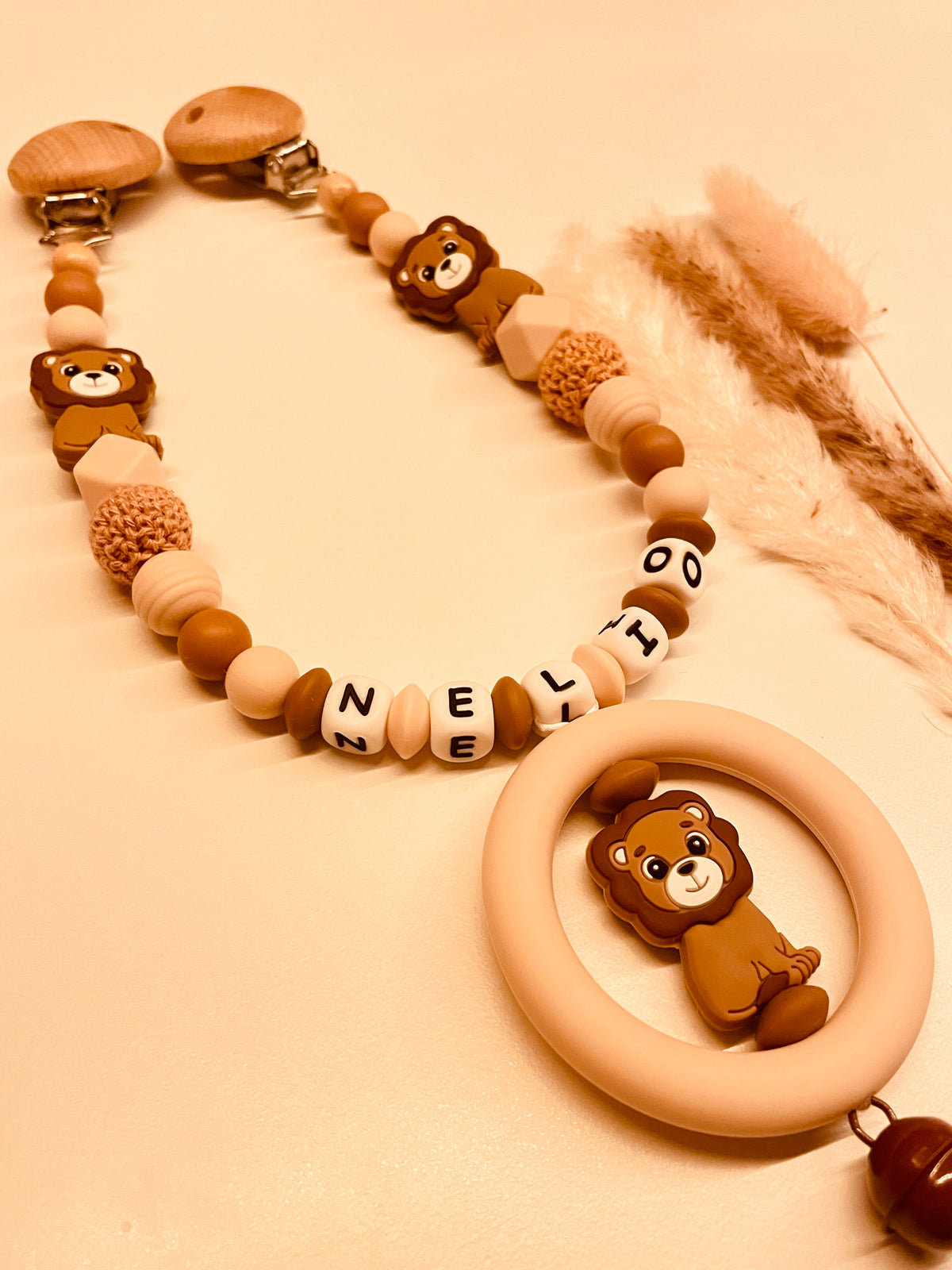 Schnullerkette Kinderwagenkette Greifring Löwe braun/beige