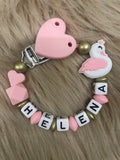 Schnullerkette Schwan rosa gold, personalisiert mit Namen