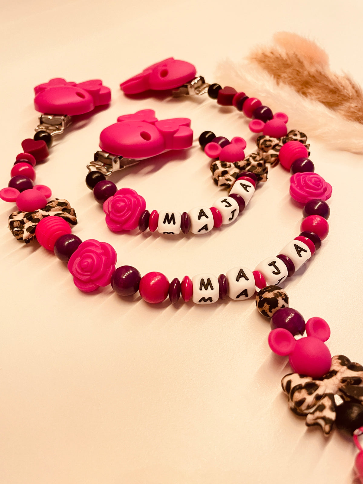 Schnullerkette, Kinderwagenkette Maus Leo pink lila
