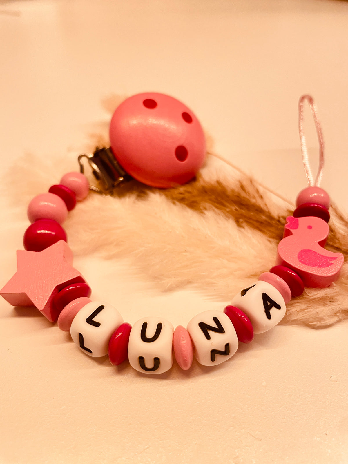 Aberkauf Schnullerkette pink Ente